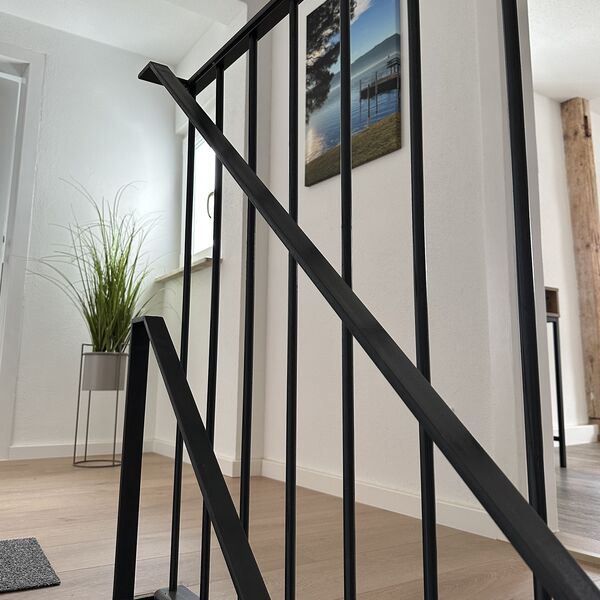 Treppe zum Obergeschoss im Ferienhaus 1850 in Balgheim im Donaubergland